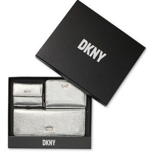 DKNY Lumen Wallet, Card Holder, and Earbud Case in Silver.